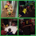 A group of kids playing games in the room.